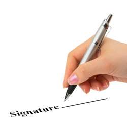 Hand with pen and contract